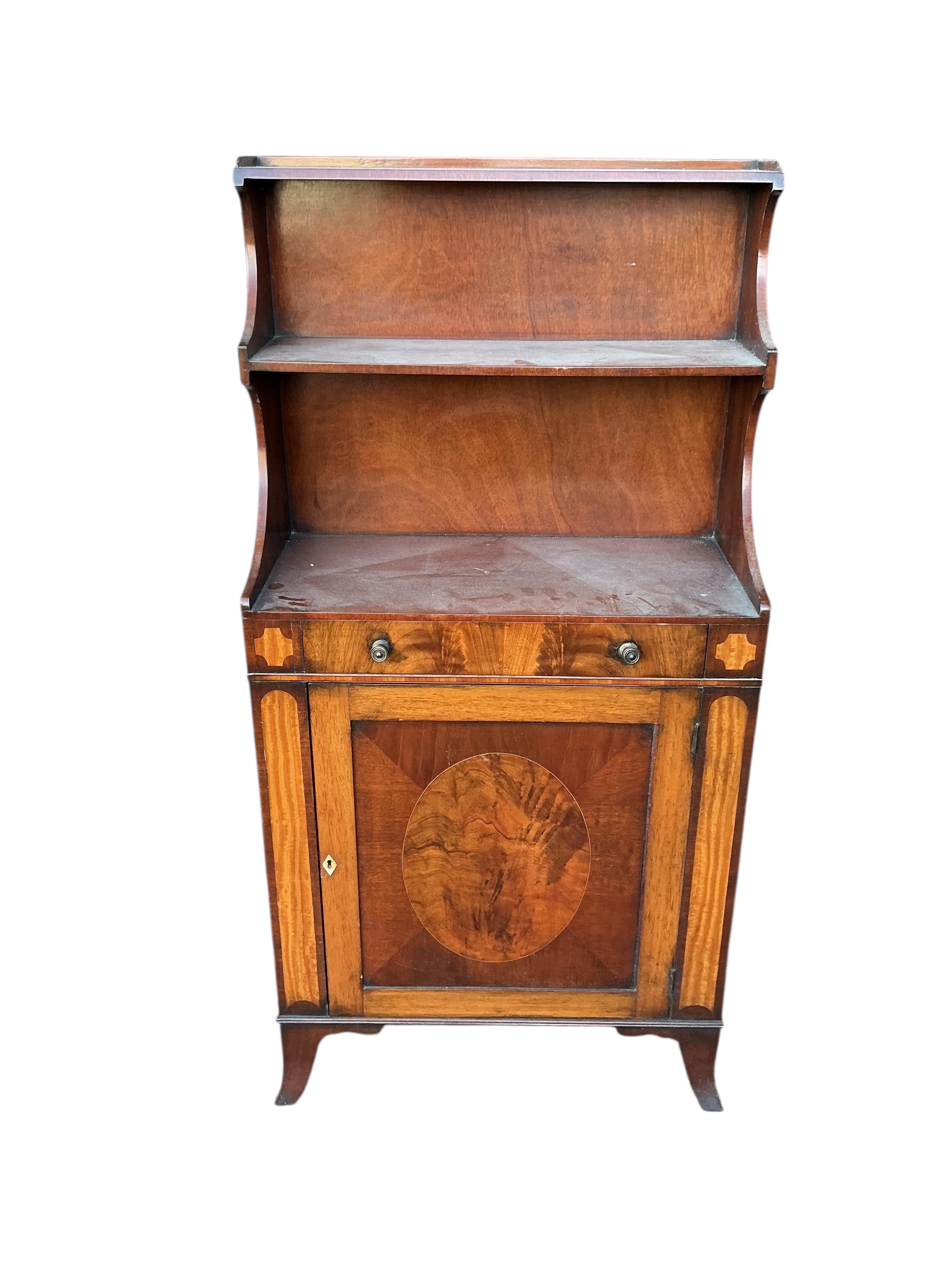 A small Regency style mahogany bookcase, width 60cm, depth 27cm, height 122cm